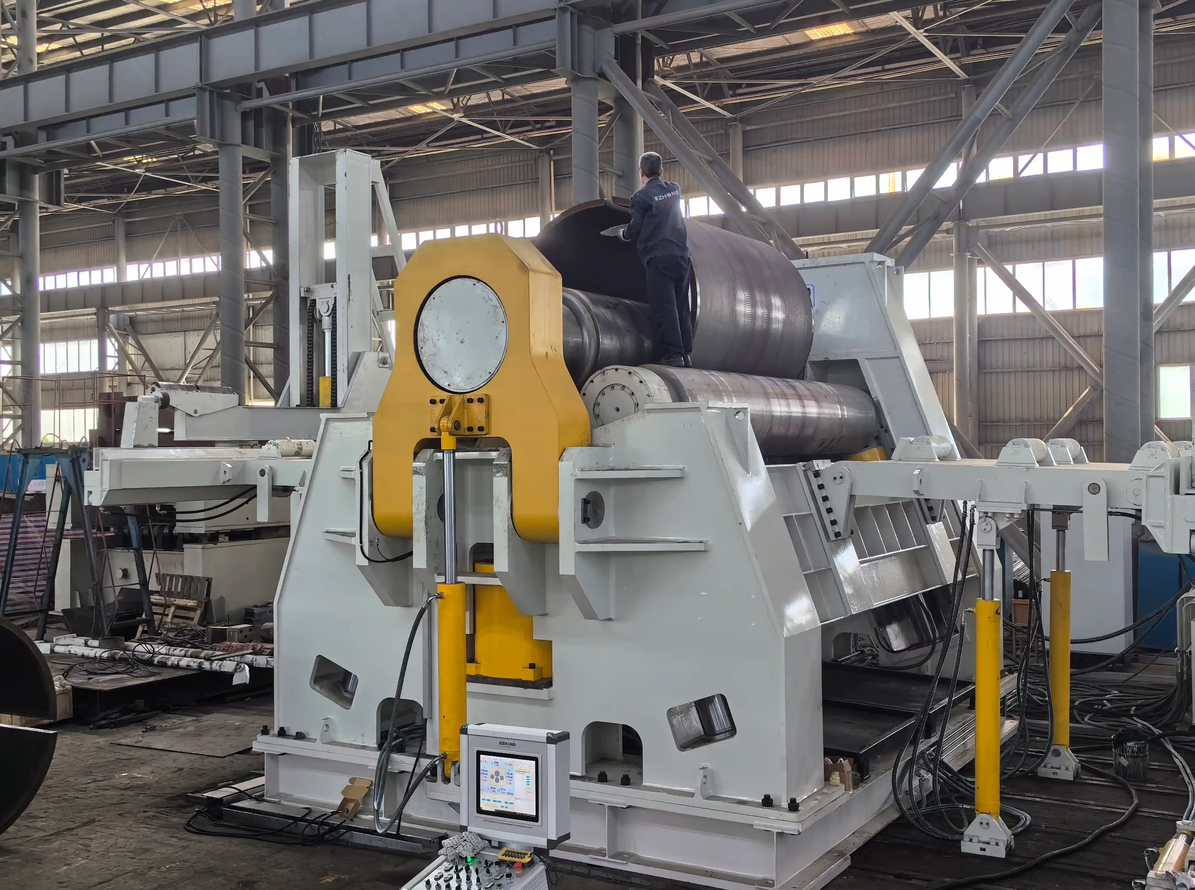 Hydraulic clamping and side roll positioning system